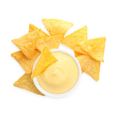 Tasty cheese dipping sauce in bowl and nacho chips isolated on white, top view