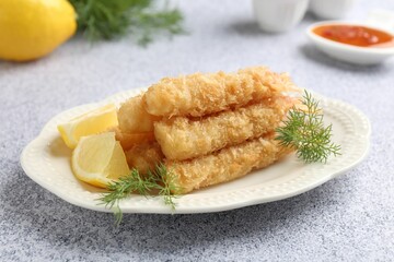 Tasty tempura shrimps, lemon and dill on grey textured table, closeup