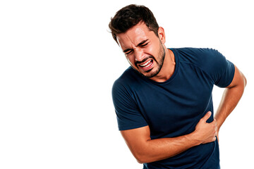 Obraz premium A man holds his side with an expression of pain. Space for text.