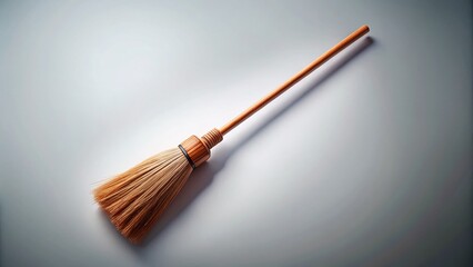 High-Angle Drone Shot of a Single Wooden Broom Stick Isolated on a Clean Background