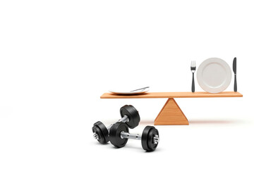 Balance between dumbbells and plate on the scale. Space for text.