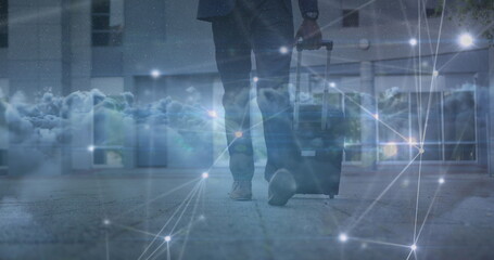 Image of data processing over clouds and biracial businessman walking