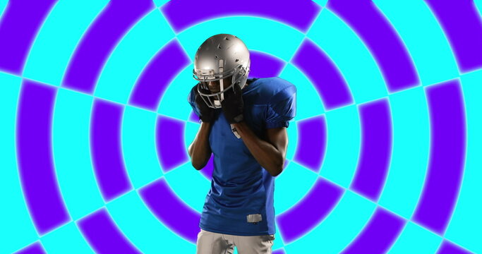 Image of african american male american football player with helmet over shapes - Powered by Adobe