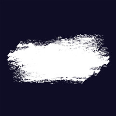white paint brush stroke on a dark blue background. The edges of the stroke are uneven and textured, suggesting a dry brush or a quick application of paint.