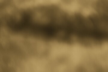 Ethereal earthy texture in sepia tones with blurred elements creating soft depth