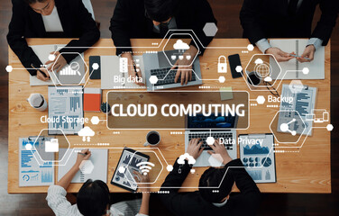 A dynamic team meeting focused on cloud computing strategies in a modern office environment,...