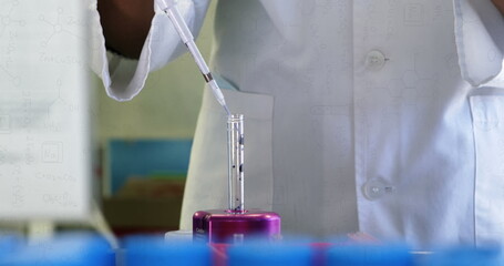 Image of chemical formulas over hands of african american female lab worker with sample