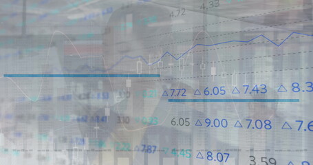 Image of financial data processing over diverse business people in office