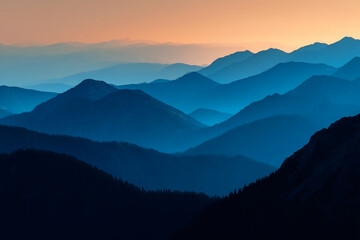 Layered blue mountains at sunset, creating a serene and tranquil landscape, showcasing nature's beauty and calmness, perfect for travel or nature themes