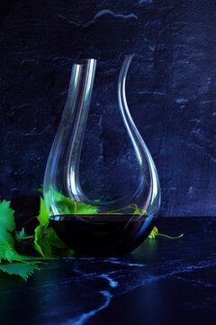 Decanting red wine concept with swan style decanter that is suitable for bold wine such as shiraz cabernet shown.