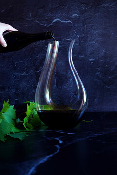 Decanting red wine concept with swan style decanter that is suitable for bold wine such as shiraz cabernet shown.