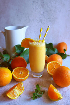 Healthy Breakfast Smoothie Made with Fresh Orange Juice and Coconut Milk with Negative Space