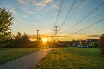 Electric transmission tower at sunset