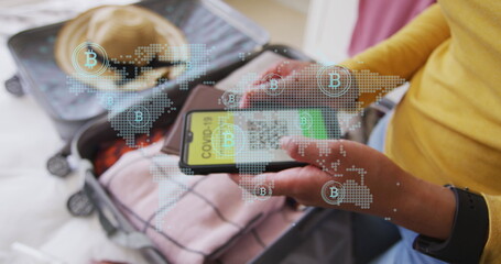 Image of data processing over biracial woman using smartphone