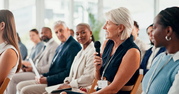 Audience, woman and mic with question for business, opinion or employee engagement in conference. Group, corporate training or person in seminar with discussion, feedback or speech to voice concern