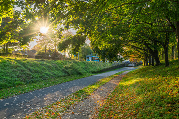 Fairlands way public footpath with sun flare in Stevenage, England