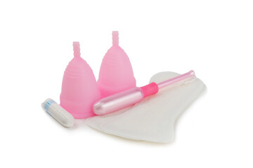 Menstrual cup isolated on white background. Sanitary napkins, tampons and menstrual cup. Concept of critical days, menstruation.feminine hygiene product. Women health concept.Premenstrual syndrome.