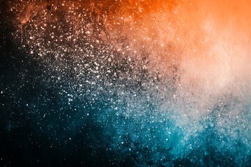 Abstract cosmic background with orange, blue, and black gradient and sparkling particles