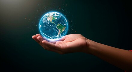 A glowing earth held in a hand against a dark background showing continents and oceans with light effects