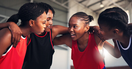 Happy women, basketball and team with huddle for match, game plan or motivation on court. Group, meeting or female people with hug in unity for sports competition, challenge or mission together
