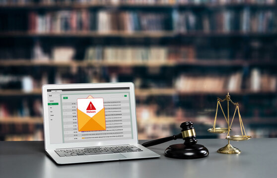 Cyber attacking concept. Malware alert showing on computer screen display scam and threat detection on computer system or online server to be removed brisk.