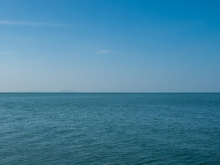 Obraz premium Photography landscape beautiful summer panorama horizon look view shore open sea beach cloud clean and blue sky background calm nature ocean wave water nobody travel at thailand chonburi sun day time