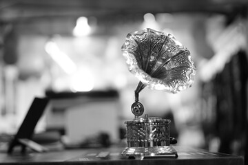 Fototapeta premium Vintage Gramophone in Black and White with Blurred Background