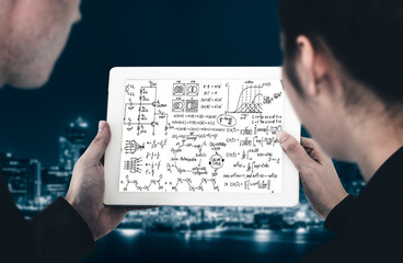 Mathematic equations and modish formula on computer screen showing concept of science and education