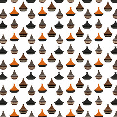 background Moroccan ceramic tagine dishes feature a conical lid and intricate designs and are used to slow cook flavorful North African dishes.