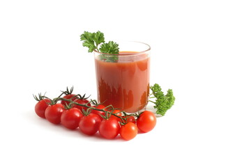 One glass with freshly squeezed tomato juice stands on a white background.
