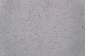 Fototapeta premium Concrete wall with traces of impacts and cracks. Abstract construction background.