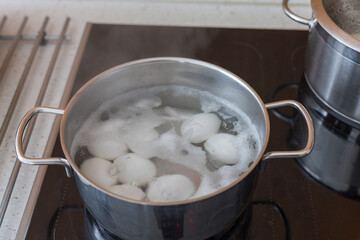 Egg whites are boiled in water