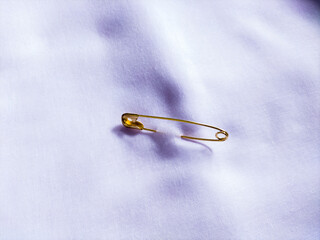 Fototapeta premium safety pins on white background