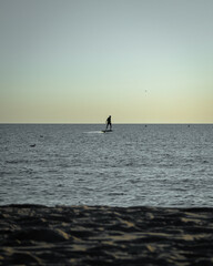 Fototapeta premium surfer at sunset