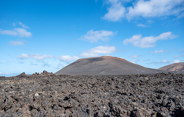 Landscape photography of mountain and desert with volcanic stones, Timanfaya National Park,...