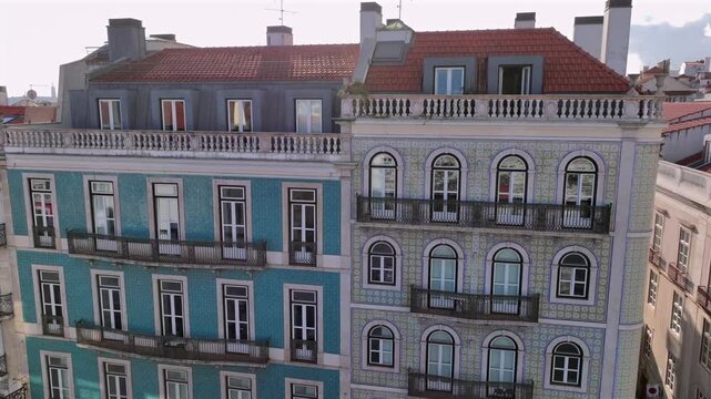 Azulejo Fascades in Lisbon. Aerial view of an Old Portuguese House decorated with Ceramic Tiles - Traditional Azulejo