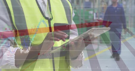 woman wearing safety vest tapping tablet in factory, overlaying financial charts and red arrow - Powered by Adobe
