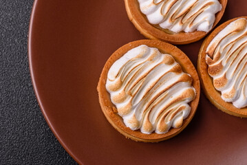 Lemon tart, meringue pie or fruit cream tart