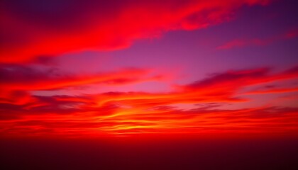 Obraz premium Breathtaking Sunset with Vibrant Hues of Red and Purple Skies