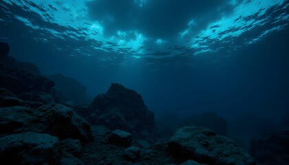 Dark Blue Ocean Depths with Sunlight Filtering Through Water Surface
