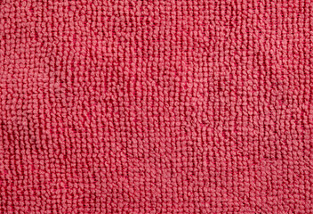 Red microfiber fabric texture closeup
