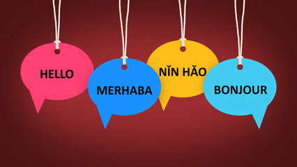 Paper speech bubbles with greetings in different languages hanging on dark red background. Banner design © New Africa