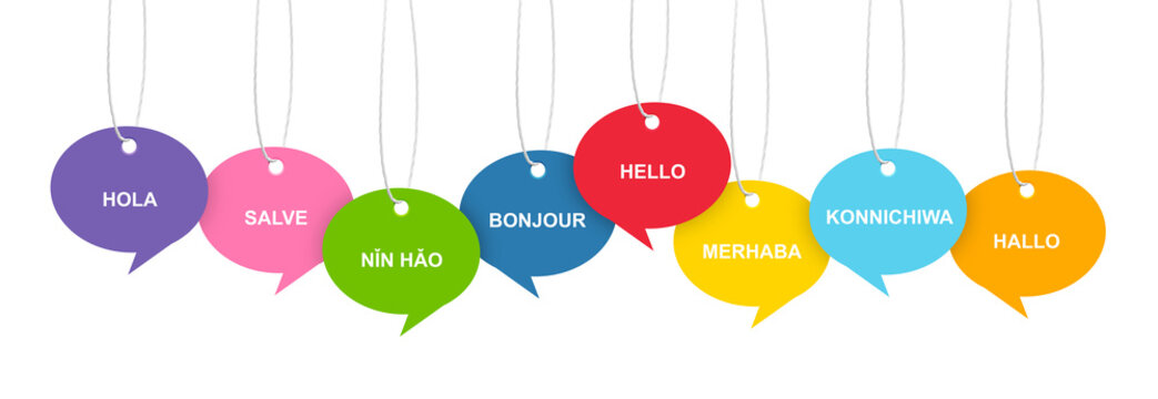 Paper speech bubbles with greetings in different languages hanging on white background. Banner design