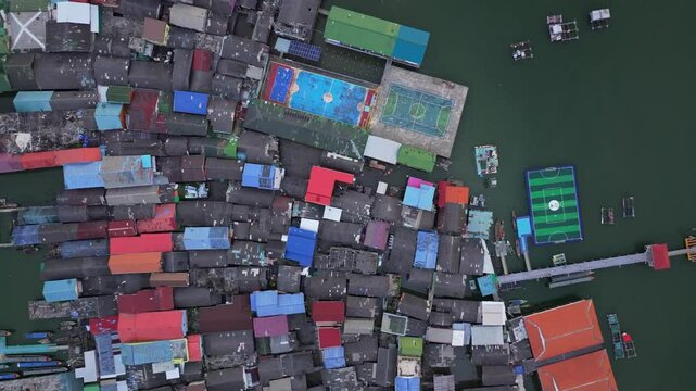 Aerial of Koh Panyi traditional floating fishing village, Thailand. Aerial drone video