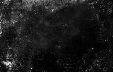 A dark, scratched black texture with a distressed, grungy look perfect for backgrounds or edgy design work.