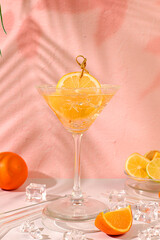 Margarita cocktails with lemon and orange, ice cubes, rum and tequila. Summer party and holiday concept. Banner with alcoholic drinks and tropical fruits. Menu for a bar or cafe