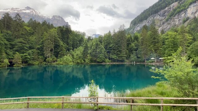 Timelapse of lake Blausee in the mountains of Switzerland 