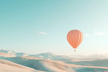 Fototapeta premium Serene Peach Hot Air Balloon Soaring Over Calm Desert Landscape