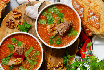 Traditional Georgian soup kharcho with walnuts.top veiw