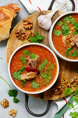 Traditional Georgian soup kharcho with walnuts.top veiw